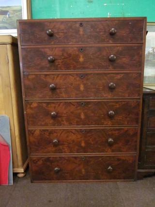 A walnut chest of 6 long drawers with tore handles, in 2 sections, 42"