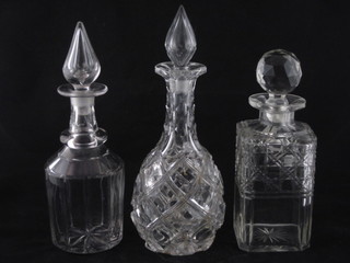 A square cut glass spirit decanter and stopper and 2 club shaped  glass decanters and stoppers