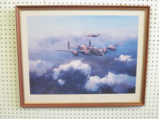 A coloured print "Lancaster Bomber" signed by Leonard Cheshire 14" x 18 1/2"