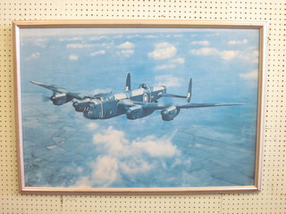 A coloured print "Lancaster Bomber in Flight" 23" x 35"