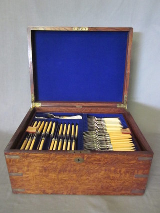 A good canteen of silver plated Kings Pattern flatware contained  in an oak box
