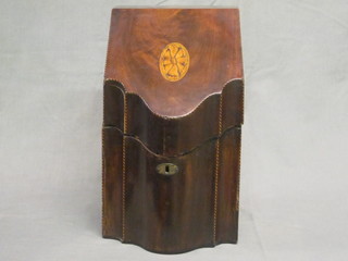 A Georgian mahogany knife box of serpentine outline and with  hinged lid 9"  ILLUSTRATED