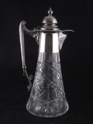 A cut glass claret jug with Britannia metal mounts