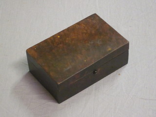 A tortoiseshell finished trinket box with hinged lid 6"