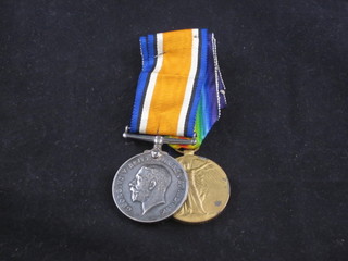 A pair of medals to G-23497 Pte. C J Powell Royal West Kents comprising British War medal and Victory medal