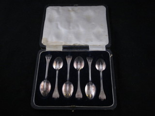 A set of 6 silver dog nose and rat tail pattern coffee spoons, Sheffield 1924, cased