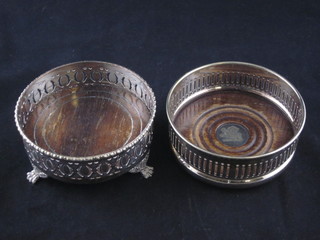 2 circular pierced silver plated bottle coasters