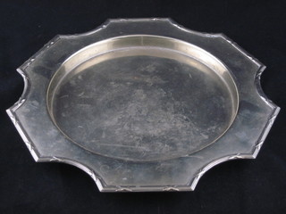 A circular bracketed silver plated cheese board holder, no board,
