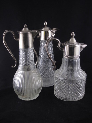 3 moulded glass claret decanters with plated mounts