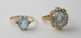 2 gilt dress ring set blue stones