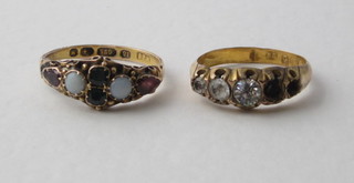 A 15ct gold dress ring set various stones and 1 other dress ring, stones missing