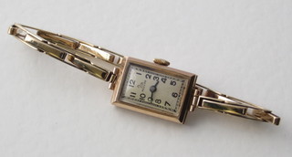 A lady's Record wristwatch contained in a 9ct case and with 9ct gold bracelet
