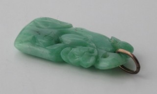 A jade coloured pierced hardstone pendant
