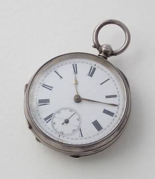 A silver open faced pocket watch with enamelled dial, Roman numerals and subsidiary second hand contained in a silver oak  case