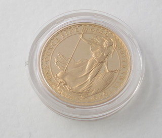 A 1989 Britannia 1 ounce proof gold coin, complete with certificate, cased