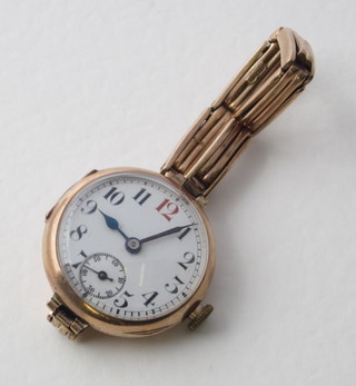 A lady's Rolex wristwatch with circular enamelled dial having Roman numerals and subsidiary second hand, contained in a 9ct gold case, the movement and case marked Rolex