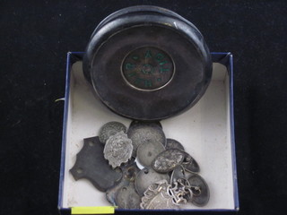 A silver and enamel hair tidy lid, a silver watch chain medallion  and a small collection of silver coins