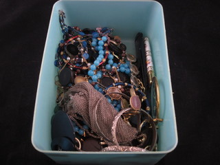 A chain mail evening bag and a collection of costume jewellery