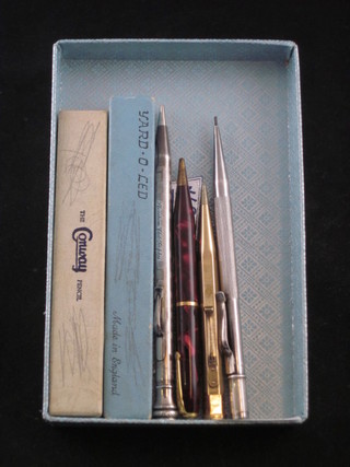 A Conway propelling pencil contained in a green marble finished case, a Yard-O-Lead propelling pencil, a silver propelling pencil  marked Horsham Club Trophy, a Conway 25 propelling pencil, a  gilt cased Yard-O-Lead do. and 1 other