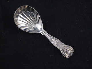 A William IV silver Queens pattern caddy spoon with scallop shaped bowl, London 1830