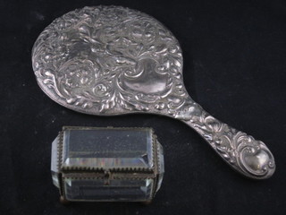 A Victorian rectangular faceted glass trinket box with hinged lid  3" and an embossed silver backed hand mirror