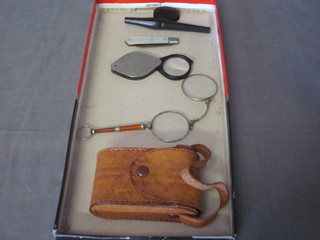A pair of opera glasses, a pair of lorgnettes, a silver bladed  folding fruit knife, a Bakelite and white metal cigarette holder etc