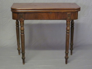 A 19th Century D shaped mahogany tea table, raised on turned supports, 36"