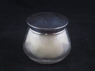 A circular cut glass dressing table jar with silver lid, Birmingham 1924 3"