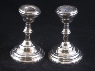A pair of silver candlesticks, Birmingham 1912 5"