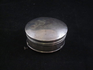 A circular silver trinket box with hinged lid 3", raised on 3 feet -  1 f,
