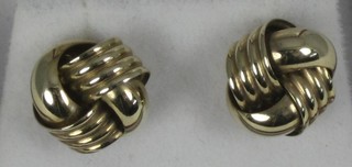 A pair of 9ct gold knot earrings