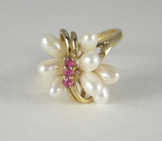 A lady's 9ct gold dress ring set pearls and pink stones