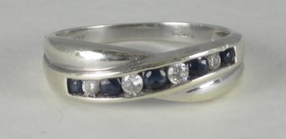 A lady's 9ct white gold half eternity ring set sapphires and  diamonds
NOT DIAMONDS