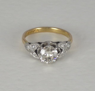 A 22ct gold and platinum dress/engagement ring set a solitaire  diamond approx 1.05ct and with diamonds to the shoulders