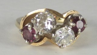 A 14ct yellow gold dress ring set 2 diamonds and a ruby