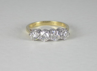 A lady's 18ct yellow gold dress/engagement ring set 4 diamonds, approx 1.50ct
