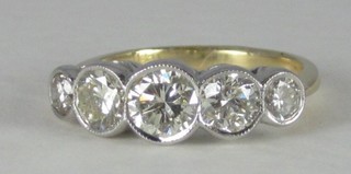 A lady's 18ct yellow gold dress ring set 5 round brilliant cut diamonds, approx 1.90ct