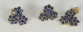 A suite of 18ct gold and sapphire set jewellery comprising  pendant and earrings