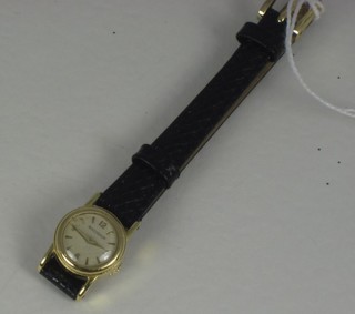 A lady's Jaeger Le Coultre wristwatch contained in an 18ct gold  case