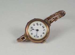 A lady's wristwatch with enamelled dial and Arabic numerals contained in a gold case
