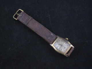 A gentleman's wristwatch with silvered dial and Arabic  numerals contained in a gold case