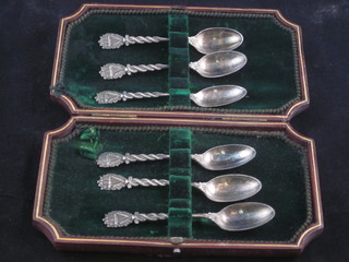 6 silver plated teaspoons decorated harps, contained in a leather  fitted case
