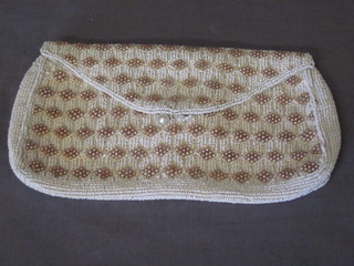 A lady's bead work evening bag