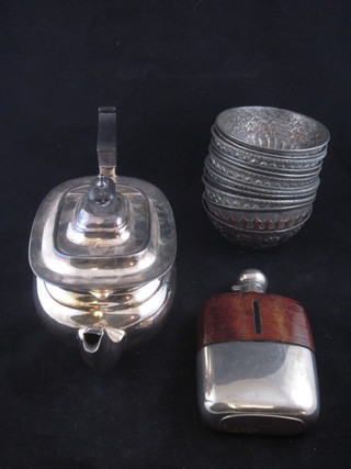 A Georgian style oval silver plated teapot, a glass hip flask and  12 Eastern embossed circular metal dishes