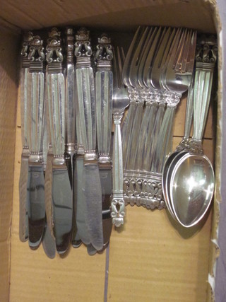 A 30 piece canteen of Jensen Sterling flatware comprising 12  knives and 12 forks, 1 knife blade f and 6 teaspoons, marked  Georg Jensen Sterling Denmark