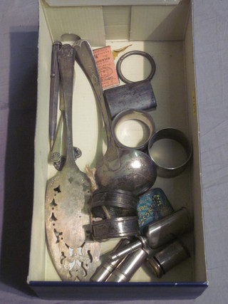 A pair of silver napkin rings, 2 others and a small collection of curios