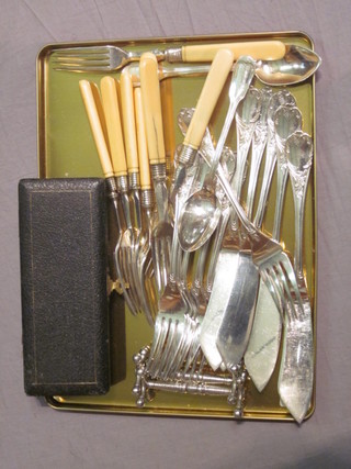 A set of 6 Kristoff silver plated fish knives and forks, a pair of  silver plated knife rests etc