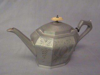 A Britannia metal teapot