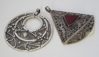 2 Eastern silver pendants