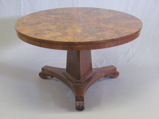 A circular Victorian snap top breakfast table with starburst inlay, raised on a chamfered column with triform base on scrolled feet,  47"  ILLUSTRATED